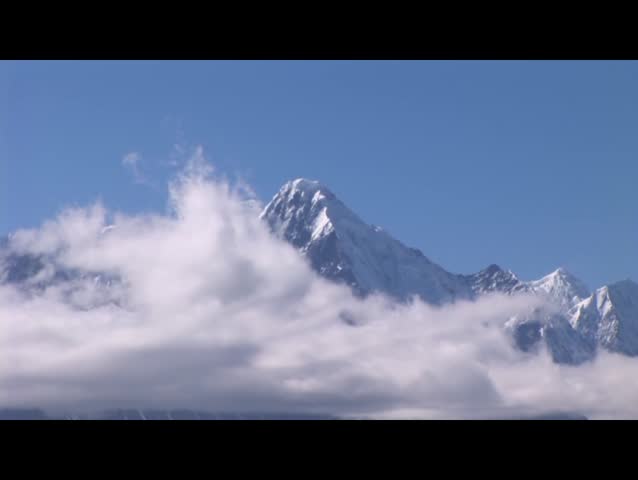 clouds over the snow mountain