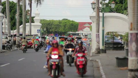 various mopeds and rickshaws in Indonesia