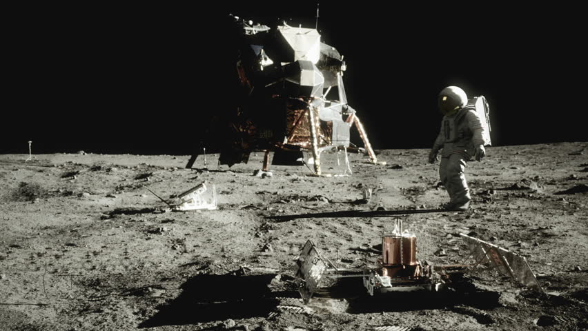 Highly realistic animation of an astronaut walking on the moon. (Graded to look like vintage film with grain, scratches, hair, and flicker) Royalty-Free Stock Footage #28949389