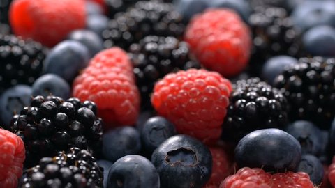 Fresh raspberries, blackberries and blueberries Stock Video