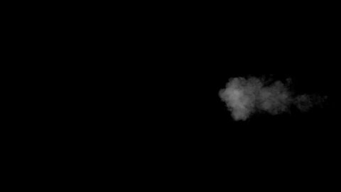 A puff of white water vapour on a black background. Close-up shot