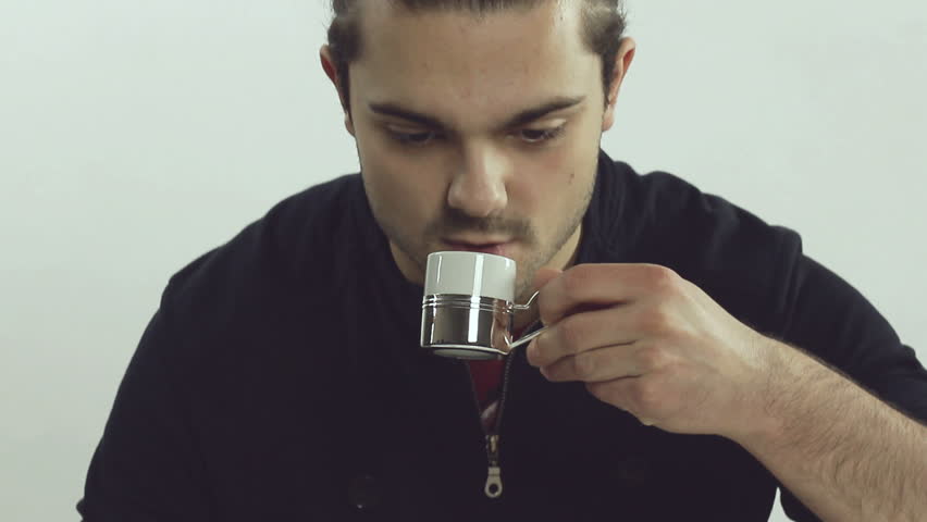 Man drinks coffee