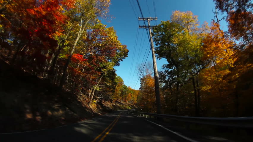 Driver's perspective of the back roads of western Pennsylvania on a crisp Autumn