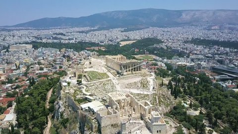 Slow Panning Aerial Video of the Parthenon and the Ruins in Athens Greece. Includes shots of the Acropolis the surrounding ruins. 