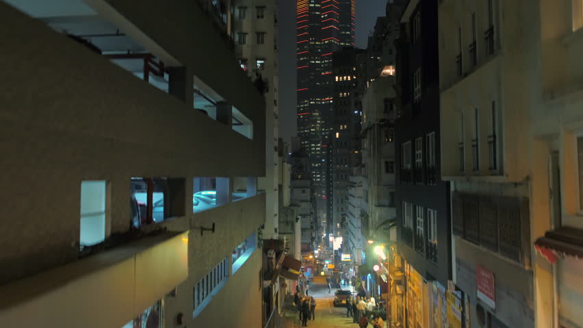 Hong Kong Aerial v68 Flying low rising up vertically with cityscape views at night