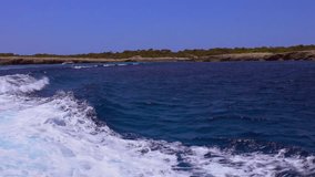 Coastal scene from boat on the South coast of Menorca