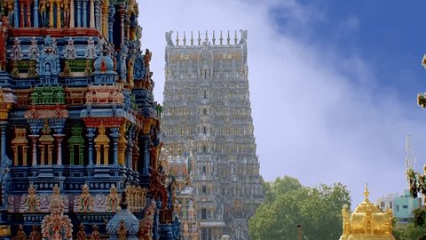 Traditional Hindu temple exterior shot, South India, Time lapse - clouds passing over a tower of the Temple in South India.