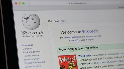 Milan, Italy - July 6, 2017: Wikipedia Website's homepage on Laptop screen. Wikipedia logo.