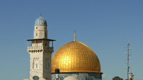 Golden Dome of the Rock and Western Wall in Jerusalem zoom out shot. Dome of the Rock is located on the top of the Temple Mount in Jerusalem, Israel.