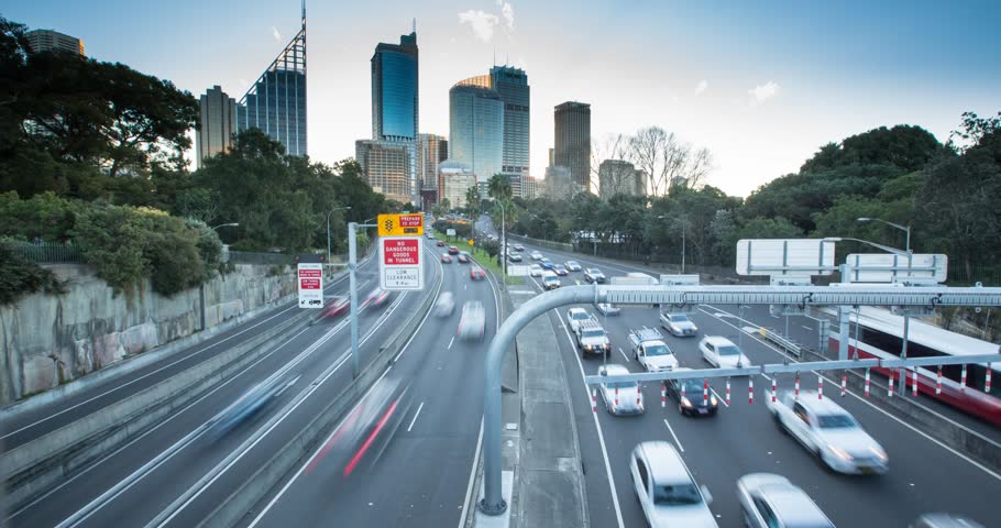 Timelapse footage a busy road turning from day to night at rush hour in Sydney, Australia Royalty-Free Stock Footage #28992919
