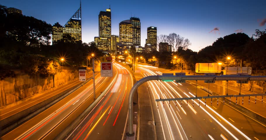 Timelapse footage a busy road turning from day to night at rush hour in Sydney, Australia