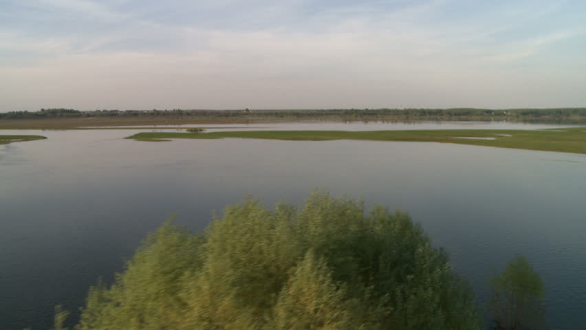 Spring river flood and horizon aerial view
