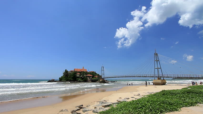 a clear day shot of matara beach, sri lanka