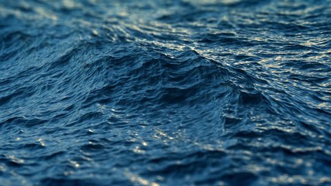 Close up of  disturbed blue ocean water surface. Nice looping background (4K,ultra high definition 2160p, seamless loop), slow motion

