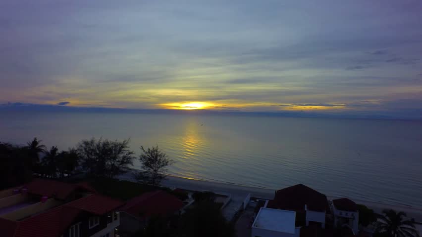 sun rise in the sea with orange sky time lapse