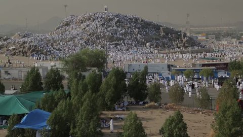 MECCA, SAUDI ARABIA - september 2016, Muslims at Mount Arafat (or Jabal Rahmah)  in Arafat, Saudi Arabia. This is the place where Adam and Eve met after being overthrown from heaven.