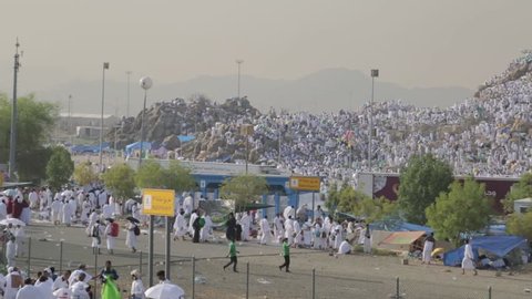 MECCA, SAUDI ARABIA - september 2016, Muslims at Mount Arafat (or Jabal Rahmah)  in Arafat, Saudi Arabia. This is the place where Adam and Eve met after being overthrown from heaven.