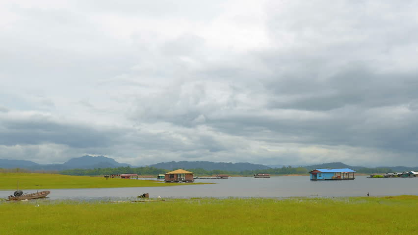 Floating houses floating in the lake with overcast weather. 