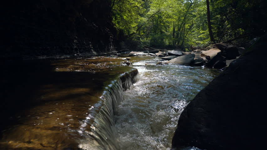Stabilized shot moving over small waterfall in Cuyahoga Valley National Park Stream