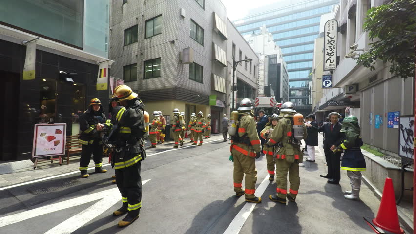 TOKYO, JAPAN - APRIL 20, 2017: Fireman on Ginza Harumi Dori