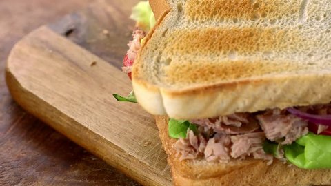 Fresh made Tuna Sandwich (seamless loopable; 4K) ஸ்டாக் வீடியோ