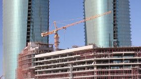 construction of skyscraper building - Powered by Shutterstock - Get 15% off with code: PIKWIZARD15