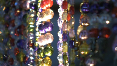 Shiny jewels hang in the sunlight creating a beautiful effect.
