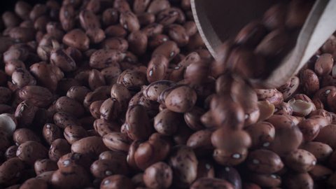 4K Grains Background, Beans Pouring from Scoop