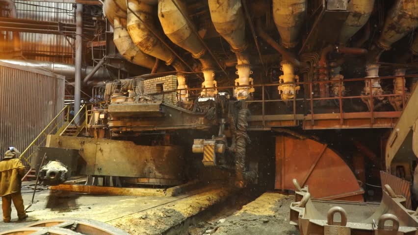 Equipment and machines at the metallurgical plant. Heavy industry. Stationary machines opening