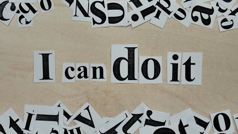 Printed On Paper Letters Make up the Word I Can Do It On Table. Paper Scraps Word I Can Do It. Motivation Concept For Business, For Self Belief, Positive Attitude, Motivation