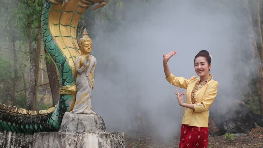 The Beautiful woman is dancing show in a temple, And Laos traditional dress. Royalty-Free Stock Footage #29104315