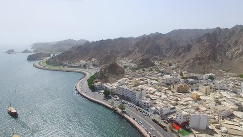 Aerial view of cityscape of Muscat, harbor and capital city of Oman, sultanate on Arabian Peninsula
