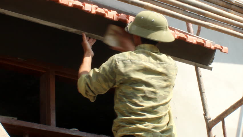 Construction worker building a home 