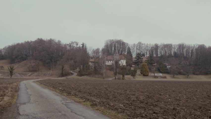 Plowed field and road