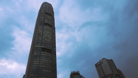 HONG KONG - CIRCA 2012: Time lapse of clouds moving behind the International Finance Centre in Central Hong Kong, China circa 2012. The famous skyscaper has become a prominent landmark