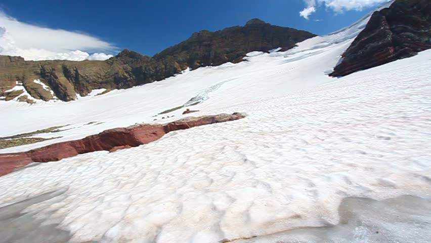 Snow and glacial rock at the Sperry Glacier in Glacier National Park of Montana