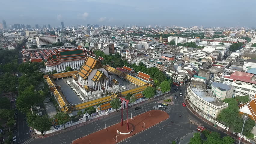 Aerial view "Wat Suthat Thepwararam" The famous ancient temple in Bangkok and The big giant swing in front of temple.