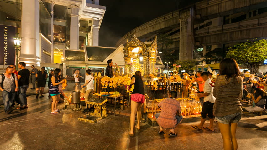 BANGKOK, THAILAND - 19 OCTOBER 2012: People are praying in the Erawan temple,