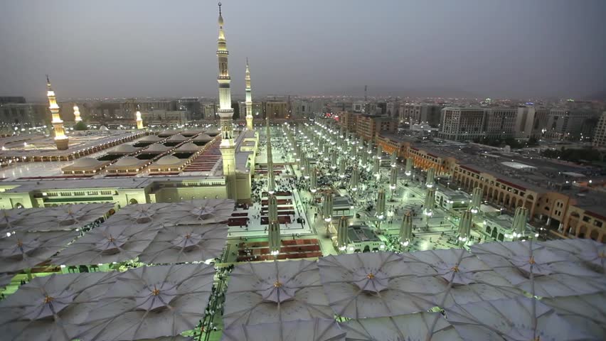 al masjid nabawi opening umbrellas timelapse Stock Footage Video (100% ...