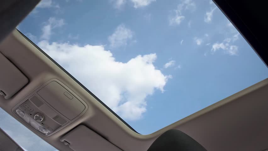 sunroof car at cloud moving Royalty-Free Stock Footage #29145799