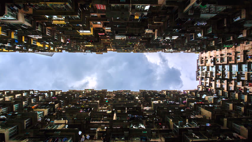 4k. Time lapse view of old Apartment with Moving Cloud in Hong Kong city of China