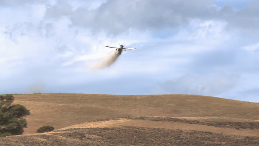 Crop duster over farm