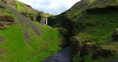 Green Valley With Waterfall - Aerial footage of Kvernufoss falls, Iceland