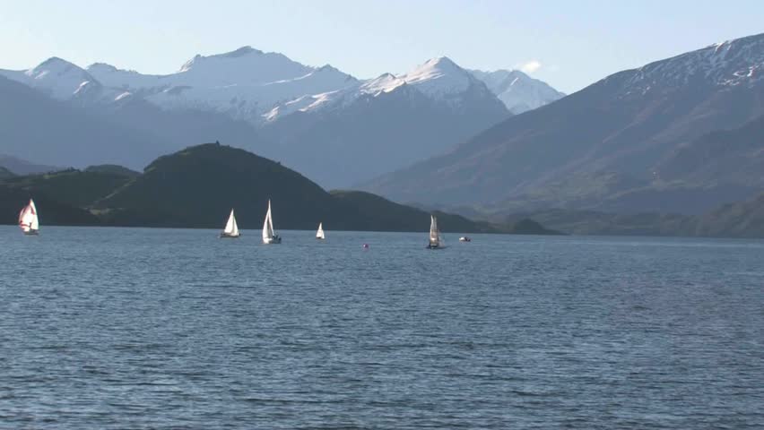 Wanaka, New Zealand, Circa July 2011. A relaxing clear day watching yachts on