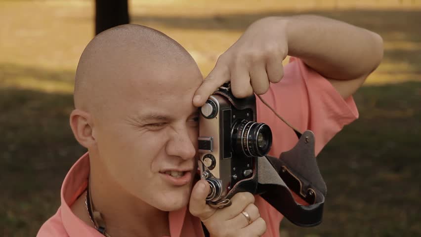 Man with an old camera