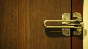 Opening Door of The Hotel Room, Unlock The Door's Hasp Latch Lock