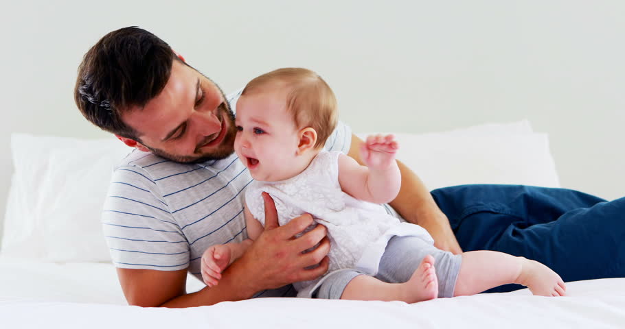 Father Playing with His Baby Arkivvideomateriale (100 % royaltyfritt)  29212888 | Shutterstock