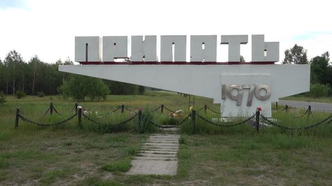 Pripyat, Chernobyl, Ukraine - 17th of June 2017: Visit to Pripyat Ghost Town - 4K Pripyat city monument sign like a cemetery
