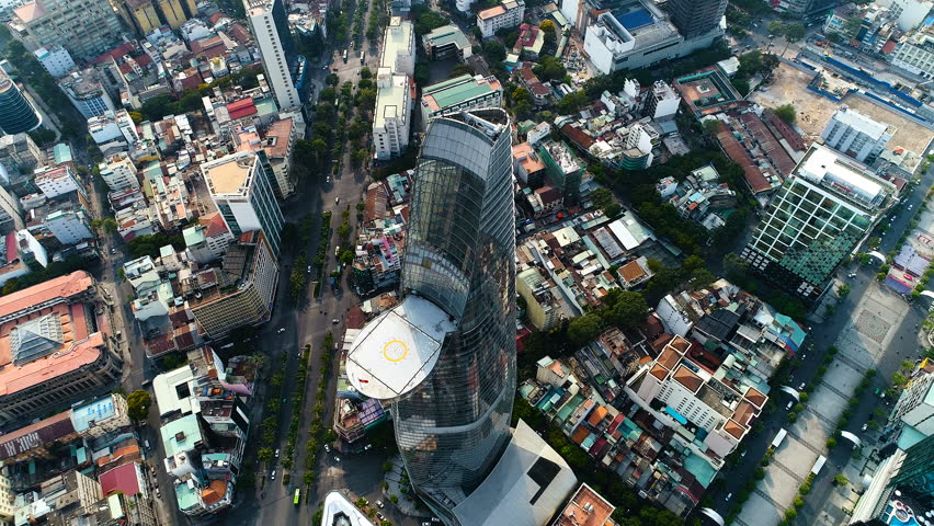 Aerial: Downtown Saigon (Ho Chi Minh City) business district. Iconic feature of the Saigon city center that for many, is the first thing that comes to mind when 'Saigon City' is mentioned. Royalty-Free Stock Footage #29227891