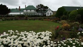 Pretty gardens and the building of Government House in Port Stanley Falklands